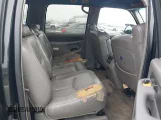 2003 Chevrolet Suburban LT z VIN 3GNFK16Z33G213287, wystawiony jako IAAI lot #41670719 z przebiegiem 190 245 mil mil oraz . Historia ofert i sprzedaży dostępna na DreamBid. Obrazek 8.