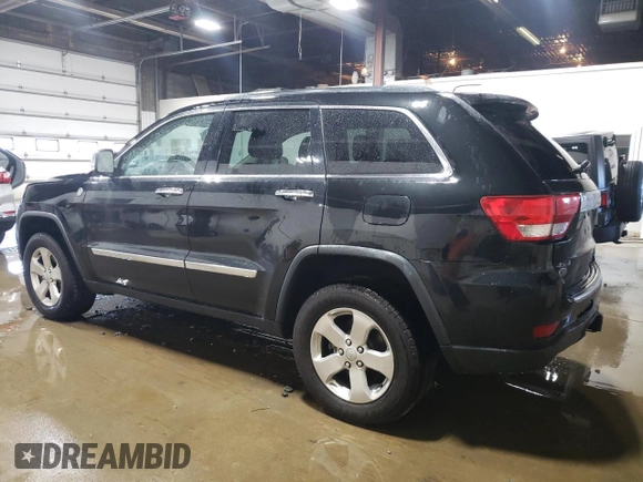 2013 Jeep Grand Cherokee Overland with VIN 1C4RJFCG7DC646348, listed as a Copart auction lot 49526415 with 137,889 mi miles and Clean Title. Bid and sale history available at carsss.com. Image 2.