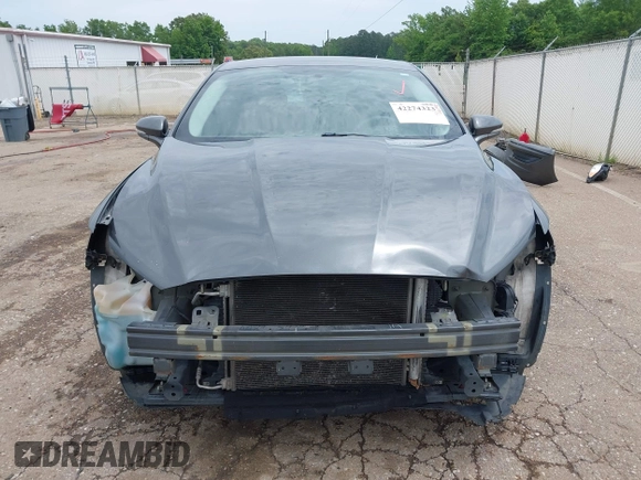 2016 Ford Fusion SE z VIN 3FA6P0H77GR367727, wystawiony jako IAAI lot #42274323 z przebiegiem 309 852 mil mil oraz . Historia ofert i sprzedaży dostępna na DreamBid. Obrazek 13.