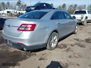 2018 Ford Taurus SEL with VIN 1FAHP2E8XJG122971, listed as a IAAI auction lot 41529729 with 93,092 mi miles. Bid and sale history available at carsss.com. Image 4.