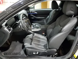 2021 BMW 4 Series M440i xDrive with VIN WBA13AR0XMCG68638, listed as a Copart auction lot 52142695 with 57,299 mi miles and Salvage Title. Bid and sale history available at DreamBid. Image 7.