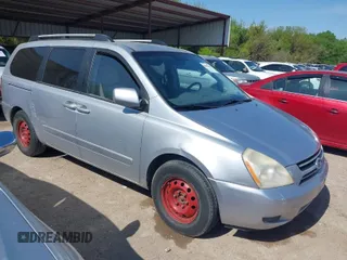 2006 Kia Sedona LX with VIN KNDMB233266036243, listed as a IAAI auction lot 41929441 with 202,851 mi miles. Bid and sale history available at carsss.com. Image 1.