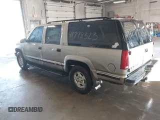 1999 GMC Suburban with VIN 3GKFK16R7XG549530, listed as a IAAI auction lot 41778323 with 174,866 mi miles. Bid and sale history available at carsss.com. Image 3.