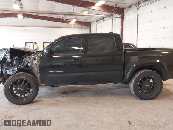 2017 Toyota Tacoma SR5 with VIN 5TFCZ5AN0HX053441, listed as a IAAI auction lot 42376148 with 100,996 mi miles and . Bid and sale history available at DreamBid. Image 14.