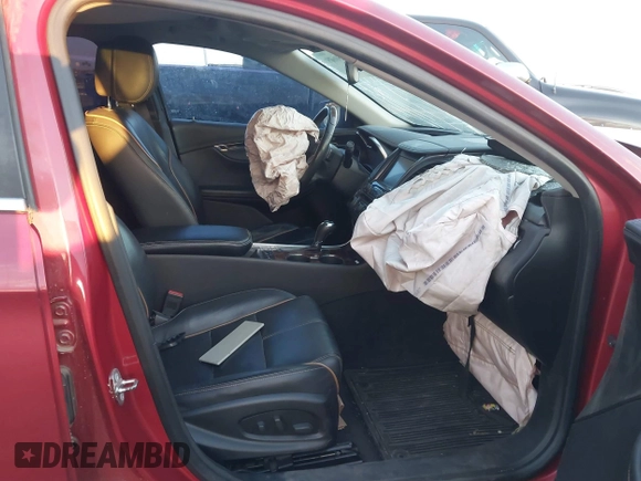 2014 Chevrolet Impala LTZ z VIN 1G1155S32EU141591, wystawiony jako IAAI lot #42150675 z przebiegiem Nie podano mil oraz . Historia ofert i sprzedaży dostępna na DreamBid. Obrazek 5.