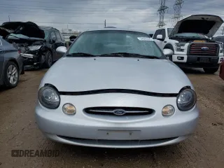 1999 Ford Taurus SE with VIN 1FAFP53U2XA134648, listed as a Copart auction lot 54305325 with 56,794 mi miles and Clean title. Bid and sale history available at DreamBid. Image 5.