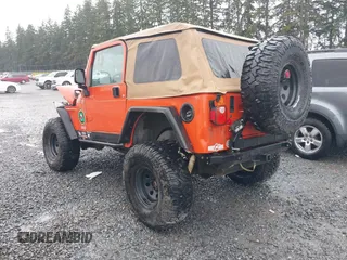 2006 Jeep Wrangler SE with VIN 1J4FA29S46P738370, listed as a IAAI auction lot 41825273 with 163,267 mi miles. Bid and sale history available at carsss.com. Image 3.