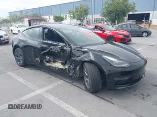 2023 Tesla Model 3 with VIN 5YJ3E1EA5PF647737, listed as a IAAI auction lot 42430145 with 20,525 mi miles and . Bid and sale history available at DreamBid. Image 1.