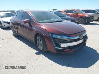 2018 Honda Clarity Touring z VIN JHMZC5F37JC019589, wystawiony jako IAAI lot #41698198 z przebiegiem 30 265 mil mil oraz . Historia ofert i sprzedaży dostępna na DreamBid. Obrazek 1.