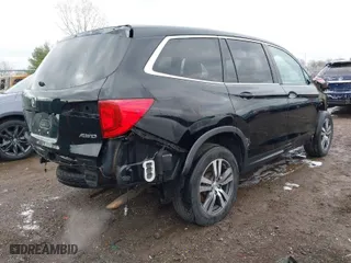 2016 Honda Pilot EX-L with VIN 5FNYF6H5XGB010700, listed as a IAAI auction lot 41895396 with 137,153 mi miles. Bid and sale history available at carsss.com. Image 4.