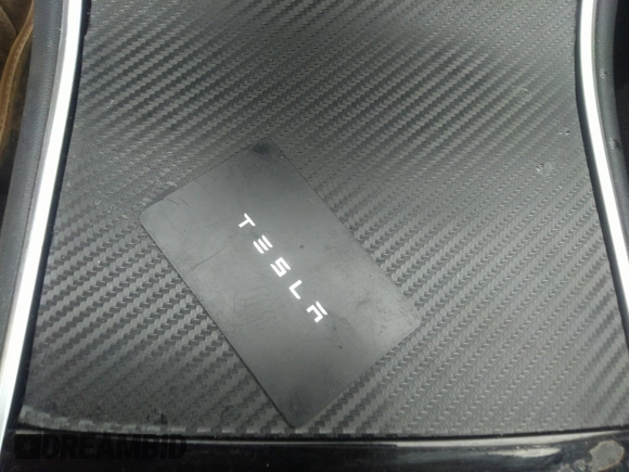 2020 Tesla Model 3 Standard Range Plus with VIN 5YJ3E1EA0LF597839, listed as a IAAI auction lot 41639219 with 49,220 mi miles. Bid and sale history available at carsss.com. Image 11.