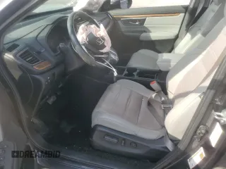 2018 Honda CR-V Touring z VIN 7FARW2H94JE077885, wystawiony jako Copart lot #55451345 z przebiegiem 133 964 mil mil oraz Szkoda całkowita • Salvage title. Historia ofert i sprzedaży dostępna na DreamBid. Obrazek 7.