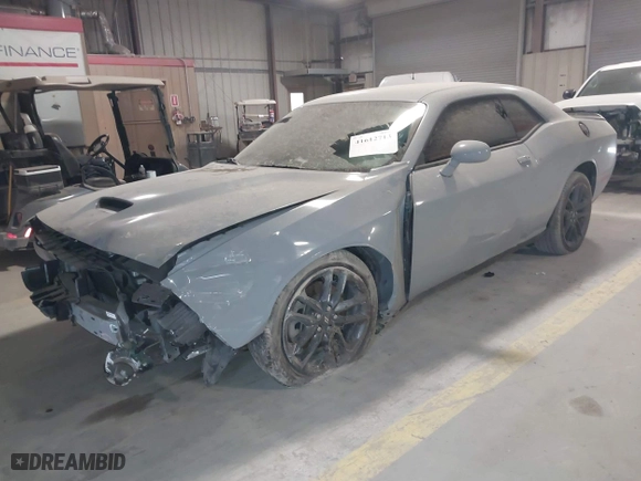 2021 Dodge Challenger GT with VIN 2C3CDZKG6MH642079, listed as a IAAI auction lot 41612713 with 76,863 mi miles. Bid and sale history available at carsss.com. Image 2.