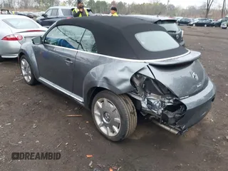 2019 Volkswagen Beetle S with VIN 3VW5DAAT6KM505210, listed as a IAAI auction lot 42084818 with 24 mi miles and . Bid and sale history available at DreamBid. Image 6.