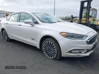 2017 Ford Fusion Titanium z VIN 3FA6P0SU5HR299556, wystawiony jako IAAI lot #42117166 z przebiegiem Nie podano mil oraz . Historia ofert i sprzedaży dostępna na DreamBid. Obrazek 1.