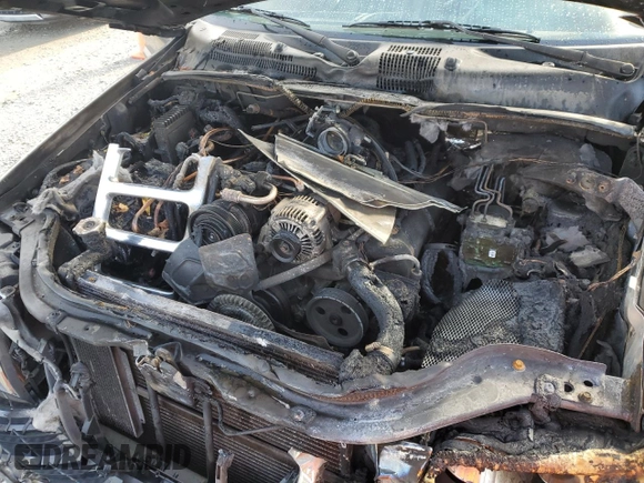 1999 Jeep Grand Cherokee Laredo z VIN 1J4GW58N1XC737706, wystawiony jako Copart lot #83107914 z przebiegiem Nie podano mil oraz Szkoda całkowita • Salvage title. Historia ofert i sprzedaży dostępna na DreamBid. Obrazek 14.