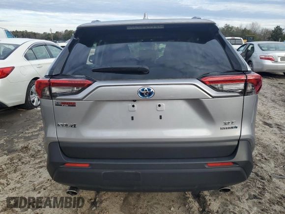 2023 Toyota RAV4 Hybrid XLE Premium z VIN JTMB6RFV8PD115723, wystawiony jako Copart lot #88005175 z przebiegiem 18 363 mil mil oraz Szkoda całkowita • Salvage title. Historia ofert i sprzedaży dostępna na DreamBid. Obrazek 6.