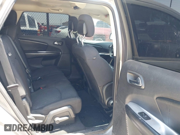 2013 Dodge Journey SXT with VIN 3C4PDCBB4DT563709, listed as a IAAI auction lot 42019033 with 201,188 mi miles. Bid and sale history available at carsss.com. Image 8.