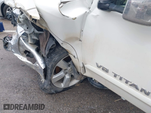 2012 Nissan Titan SL with VIN 1N6AA0EC7CN311109, listed as a IAAI auction lot 41420110 with 209,731 mi miles and . Bid and sale history available at DreamBid. Image 19.