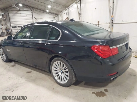 2012 BMW 7 Series 750Li xDrive with VIN WBAKC8C57CC435569, listed as a IAAI auction lot 41813222 with 139,751 mi miles. Bid and sale history available at carsss.com. Image 3.