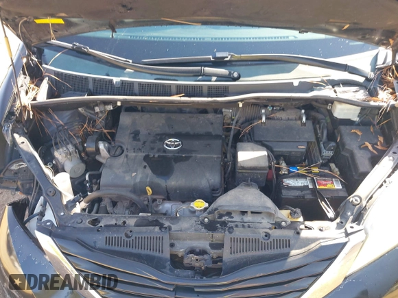 2012 Toyota Sienna LE AAS with VIN 5TDKK3DC6CS238848, listed as a IAAI auction lot 41728728 with 142,240 mi miles. Bid and sale history available at carsss.com. Image 10.