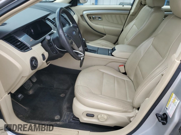 2017 Ford Taurus SEL z VIN 1FAHP2E87HG119780, wystawiony jako Copart lot #59135705 z przebiegiem 122 731 mil mil oraz Szkoda całkowita • Salvage title. Historia ofert i sprzedaży dostępna na DreamBid. Obrazek 7.