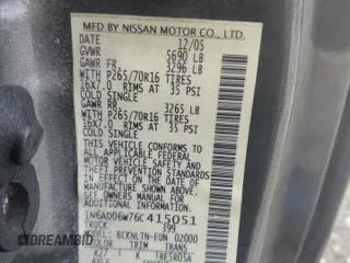 2006 Nissan Frontier SE with VIN 1N6AD06W76C415051, listed as a Copart auction lot 57486555 with 162,012 mi miles and Salvage title. Bid and sale history available at DreamBid. Image 12.
