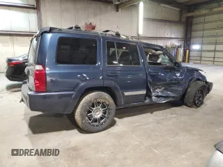 2010 Jeep Commander Sport with VIN 1J4RG4GT7AC113206, listed as a Copart auction lot 56103825 with 174,306 mi miles and Salvage title. Bid and sale history available at DreamBid. Image 3.