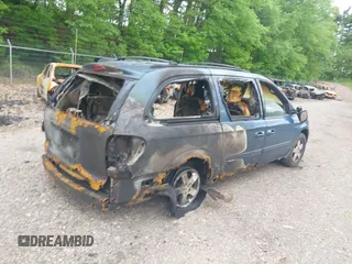 2005 Dodge Caravan SXT z VIN 2D4GP44LX5R300649, wystawiony jako IAAI lot #42251092 z przebiegiem 100 592 mil mil oraz . Historia ofert i sprzedaży dostępna na DreamBid. Obrazek 4.