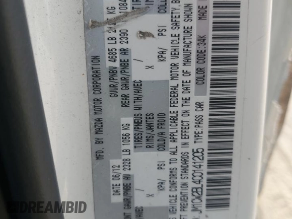 2012 Mazda 5 Sport with VIN JM1CW2BL4C0141205, listed as a Copart auction lot 71437504 with 135,271 mi miles and Salvage Title. Bid and sale history available at DreamBid. Image 12.