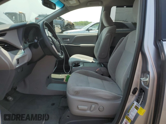 2015 Toyota Sienna LE AAS с VIN 5TDKK3DC2FS546152, выставлен на аукционе Copart как лот 59023215 с пробегом 78 583 миль миль и Списание • Salvage title. История ставок и продаж доступна на DreamBid. Изображение 7.