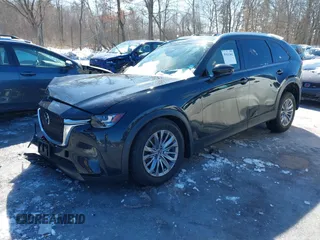 2024 Mazda CX-90 Preferred Plus with VIN JM3KKCHD7R1166459, listed as a IAAI auction lot 41621442 with 5,742 mi miles and . Bid and sale history available at DreamBid. Image 2.