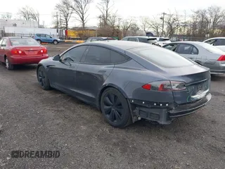 2021 Tesla Model S Long Range with VIN 5YJSA1E51MF440929, listed as a IAAI auction lot 41144902 with Not provided miles and . Bid and sale history available at DreamBid. Image 3.