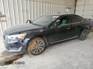 2014 Kia Cadenza Premium z VIN KNALN4D77E5144116, wystawiony jako Copart lot #56069875 z przebiegiem 99 285 mil mil oraz Szkoda całkowita • Salvage title. Historia ofert i sprzedaży dostępna na DreamBid. Obrazek 1.