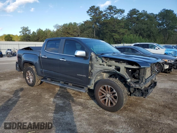 2016 GMC Canyon 2WD SLT with VIN 1GTG5DE37G1271880, listed as a Copart auction lot 79825324 with 141,748 mi miles and Salvage Title. Bid and sale history available at carsss.com. Image 4.