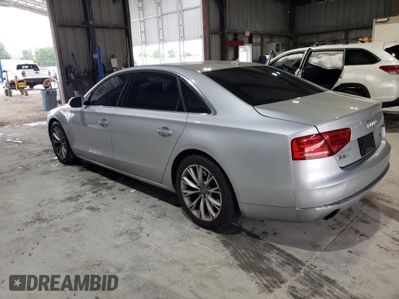 2012 Audi A8 z VIN WAURVAFD4CN038599, wystawiony jako Copart lot #59554025 z przebiegiem 93 334 mil mil oraz Szkoda całkowita • Salvage title. Historia ofert i sprzedaży dostępna na DreamBid. Obrazek 2.