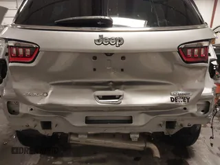 2019 Jeep Compass Latitude with VIN 3C4NJDBB6KT812711, listed as a IAAI auction lot 41565166 with 69,582 mi miles and . Bid and sale history available at carsss.com. Image 19.