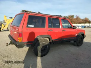 1994 Jeep Cherokee Sport with VIN 1J4FJ68S3RL239208, listed as a Copart auction lot 79121184 with 226,579 mi miles and Salvage title. Bid and sale history available at DreamBid. Image 3.