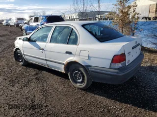 1998 Toyota Tercel z VIN JT2BC53LXW0335979, wystawiony jako Copart lot #46542655 z przebiegiem 275 340 mil mil oraz Nie do naprawy • Non repairable. Historia ofert i sprzedaży dostępna na DreamBid. Obrazek 2.