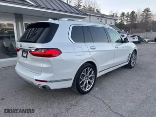 2020 BMW X7 xDrive40i with VIN 5UXCW2C05L9A03397, listed as a IAAI auction lot 41381437 with 141,656 mi miles. Bid and sale history available at carsss.com. Image 4.