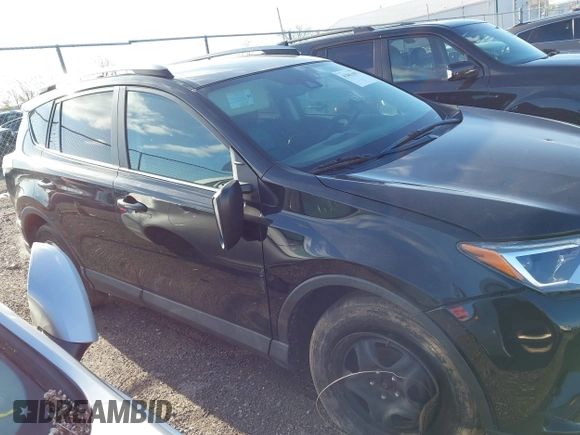 2018 Toyota RAV4 LE with VIN 2T3BFREV8JW706999, listed as a IAAI auction lot 41863485 with 115,589 mi miles. Bid and sale history available at carsss.com. Image 13.