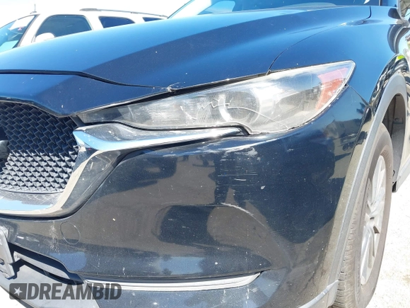 2019 Mazda CX-5 Sport with VIN JM3KFABM7K1579747, listed as a IAAI auction lot 41965097 with 151,042 mi miles and . Bid and sale history available at DreamBid. Image 19.