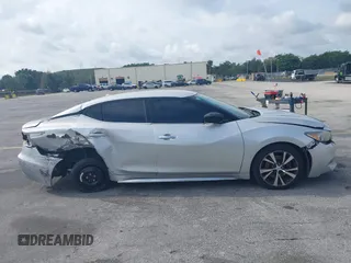 2016 Nissan Maxima SL with VIN 1N4AA6AP0GC433932, listed as a IAAI auction lot 41897180 with 91,871 mi miles and . Bid and sale history available at DreamBid. Image 14.