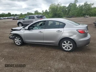 2011 Mazda 3 i Touring with VIN JM1BL1VF3B1491700, listed as a Copart auction lot 61573885 with 145,626 mi miles and Salvage title. Bid and sale history available at DreamBid. Image 2.