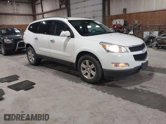 2012 Chevrolet Traverse 1LT z VIN 1GNKVGEDXCJ241794, wystawiony jako IAAI lot #41902110 z przebiegiem 138 305 mil mil oraz . Historia ofert i sprzedaży dostępna na DreamBid. Obrazek 1.