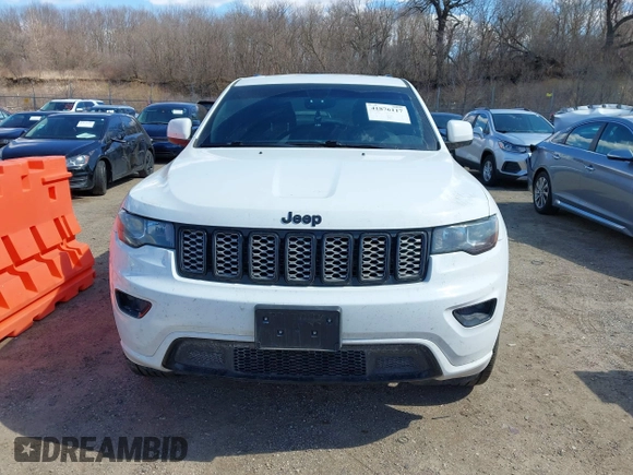 2017 Jeep Grand Cherokee Laredo with VIN 1C4RJFAG9HC824883, listed as a IAAI auction lot 41876117 with 141,067 mi miles. Bid and sale history available at carsss.com. Image 12.