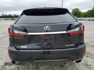 2016 Lexus RX 350 with VIN 2T2BZMCA9GC039515, listed as a Copart auction lot 58614395 with 144,614 mi miles and Salvage title. Bid and sale history available at DreamBid. Image 6.