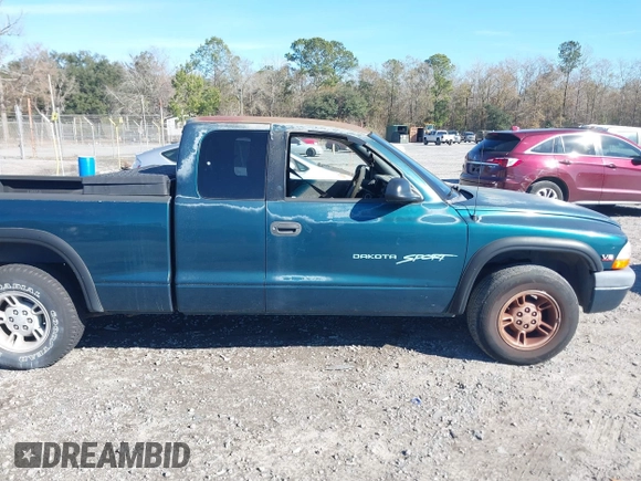 1997 Dodge Dakota z VIN 1B7GL23X0VS287930, wystawiony jako IAAI lot #41331844 z przebiegiem 144 739 mil mil oraz . Historia ofert i sprzedaży dostępna na DreamBid. Obrazek 13.