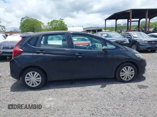 2017 Honda Fit LX z VIN 3HGGK5H58HM706357, wystawiony jako IAAI lot #42371826 z przebiegiem 91 099 mil mil oraz . Historia ofert i sprzedaży dostępna na DreamBid. Obrazek 13.