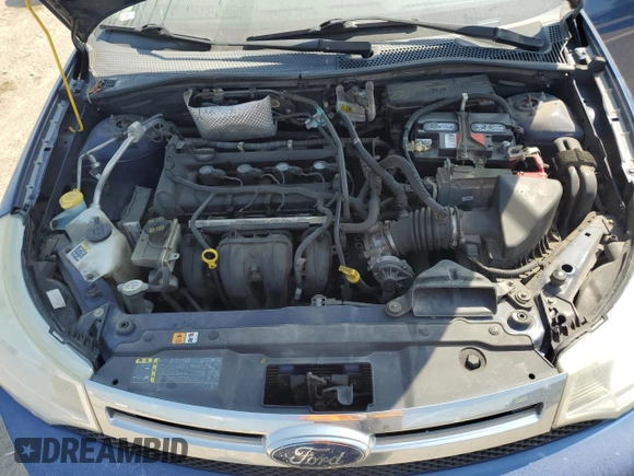 2009 Ford Focus SE with VIN 1FAHP35N69W173977, listed as a Copart auction lot 69018554 with 138,496 mi miles and Salvage Title. Bid and sale history available at DreamBid. Image 11.